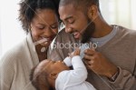 stock-photo-19788392-father-feeding-son-with-mother-looking